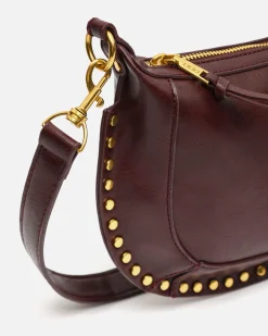 Bolso bandolera pequeño con detalles metálicos