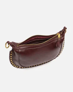 Bolso bandolera pequeño con detalles metálicos