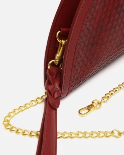 Bolso de fiesta en media luna trenzado con asa bandolera extraíble
